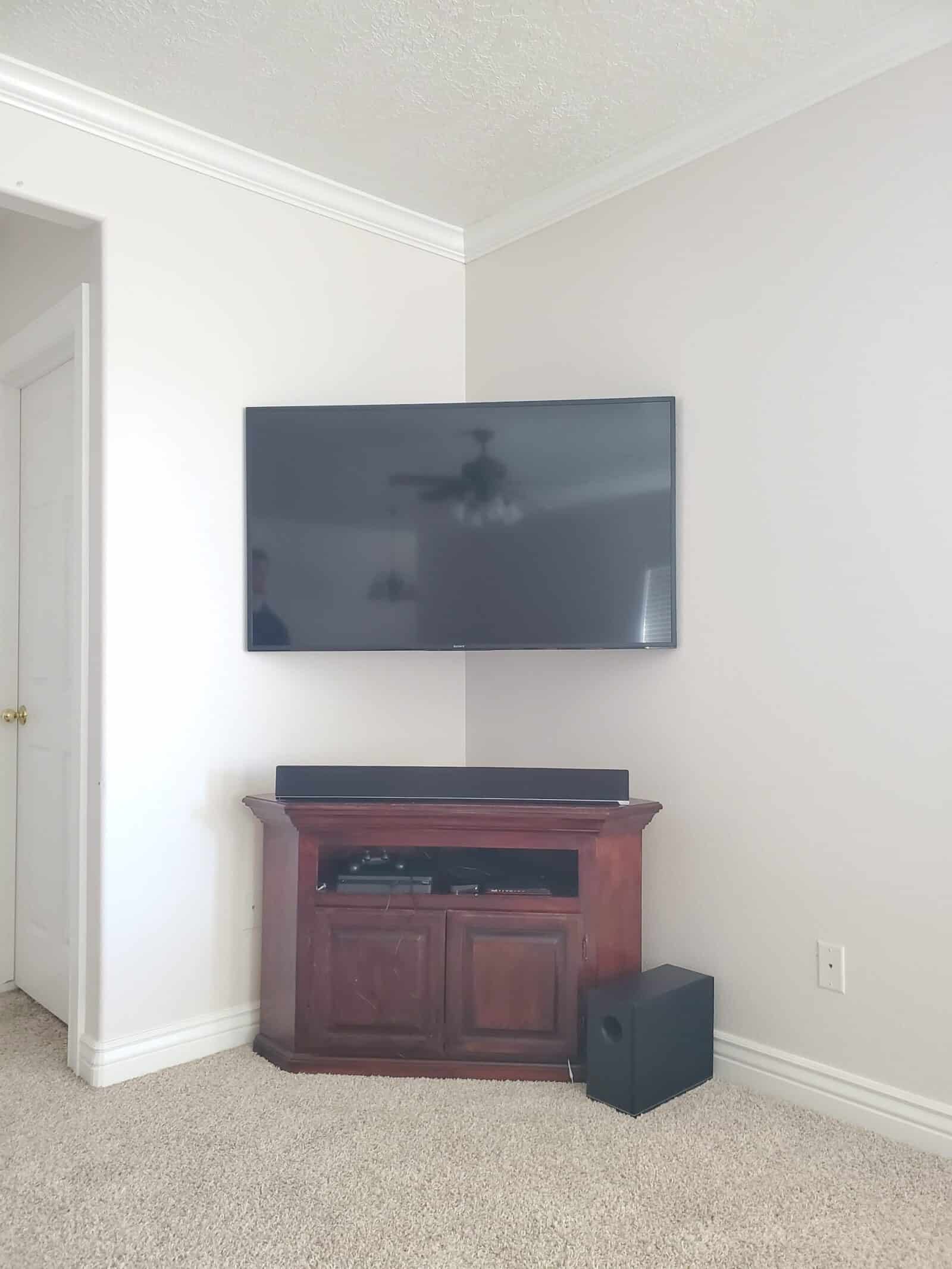 Wall-mounted television in a finished living room